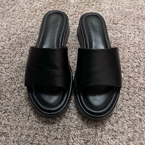 Black target sandals